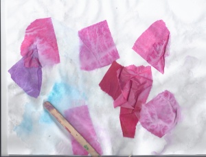 Tissue paper, watered down glue, popsicle stick